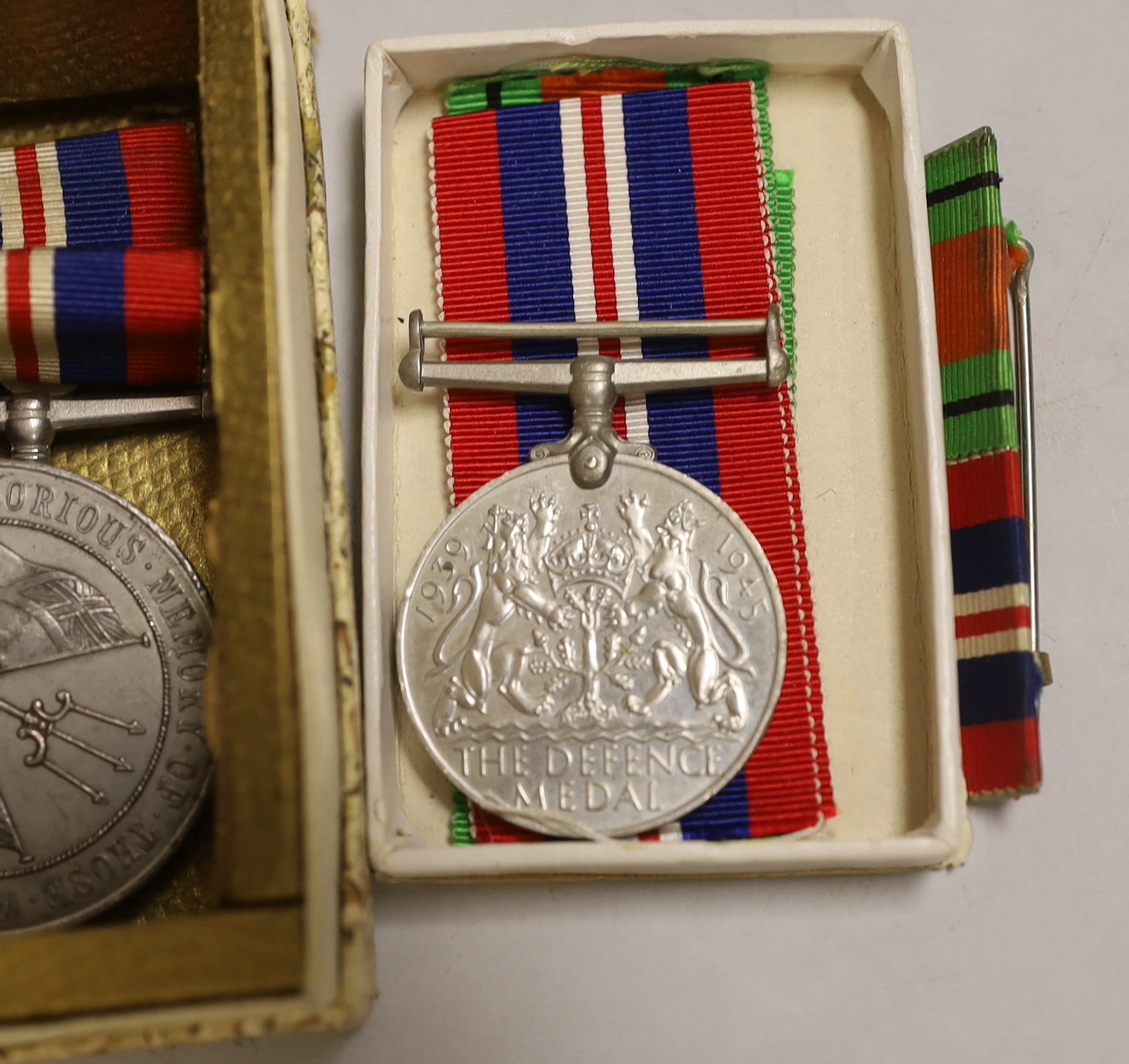 Three WWII medal groups and a German medal etc.